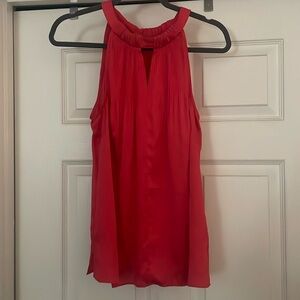 Never worn. 2 button behind the neck.